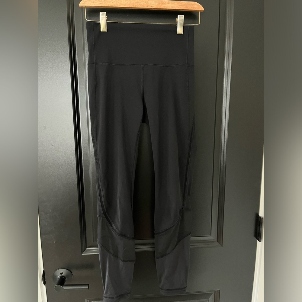 Lululemon black legging. High rise waist. Size 4.